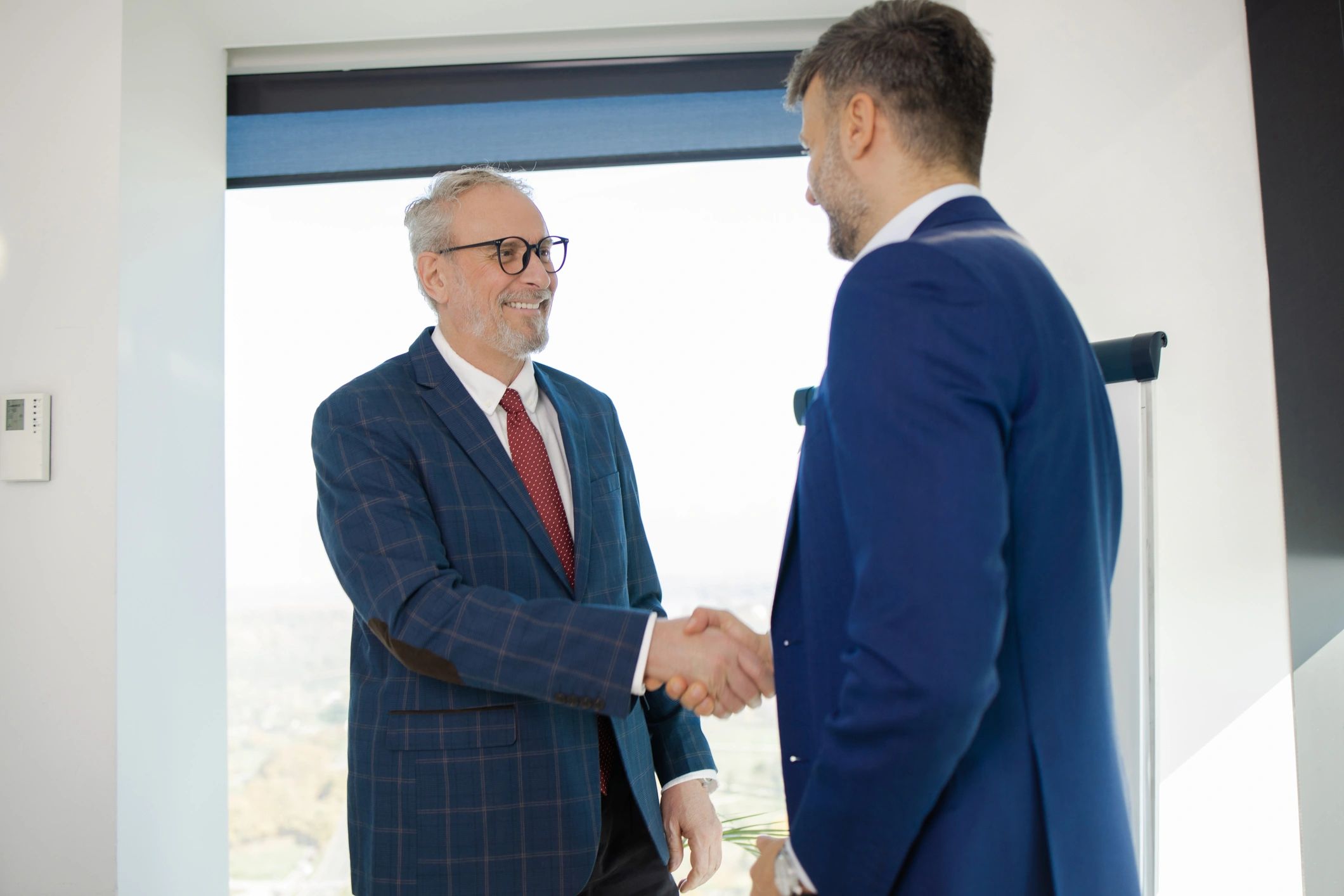 executive handshake AI consulting